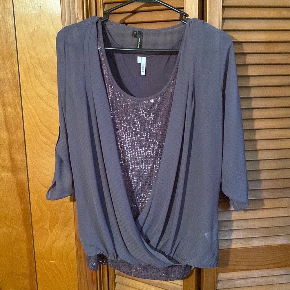Two tops, sleeveless undershirt and sheer 3/4 length blouse, grey.
